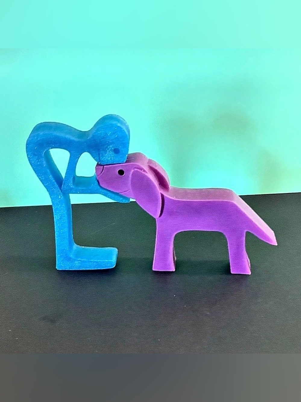 Handcrafted “Best Friends” interlocking Person & Dog Resin Sculpture